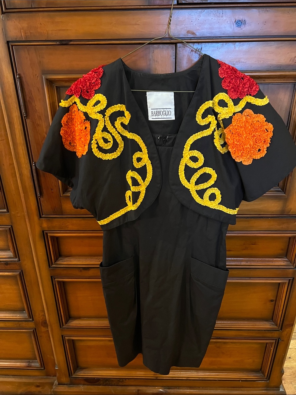 Black Formal Dress with Red, Orange & Yellow Floral Trim